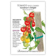 Seed packet for 'Gardener's Delight' cherry pole tomatoes with botanical illustration and information.