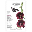 Seed packet for The Watchman Hollyhock featuring an illustration of deep maroon-black satiny blooms and a black-and-white butterfly on a tall stem, with text noting it's a biennial, full-sun heirloom growing 5 to 7 feet tall.