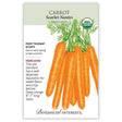 Seed packet for Scarlet Nantes Carrot featuring an illustration of bundled, deep orange 6–7 inch roots with feathery green tops, and text noting it's a frost-tolerant, USDA organic heirloom variety maturing in 65 days.