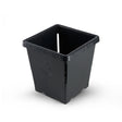 Black square plastic nursery pot with ribbed sides and drainage slots, embossed with a flower motif and "American Tray Co., Made in USA" text along the rim, shown on a plain white background.