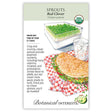 Seed packet for organic Red Clover Sprouts illustrated with a tray of dense green sprouts, a filled sandwich topped with sprouts, and a glass of ice water, alongside text noting a 5-7 day growing time and describing the crisp, nutrient-rich flavor.