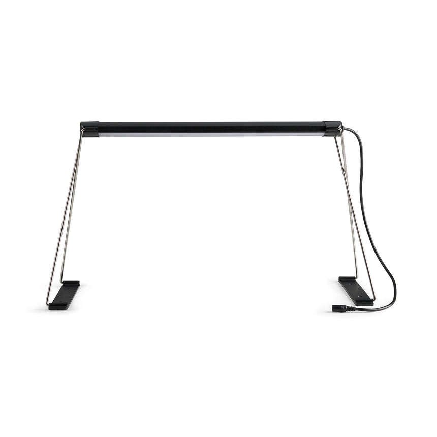 Small LED grow light bar mounted on tall metal folding legs with clip-on feet and a black power cord, shown against a plain white background.
