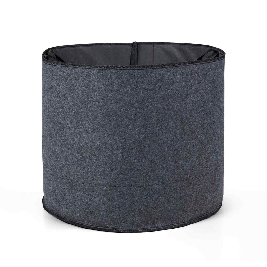 Empty round fabric grow bag in dark heather grey with black stitched rim, shown against a plain white background.