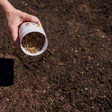 GIF of the Midwest Prairie Splendor Flower Mix Seed Shaker seeds being spread on soil.