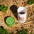 Opened Southern Hills and Plains Flower Mix Seed Shaker canister on a straw background